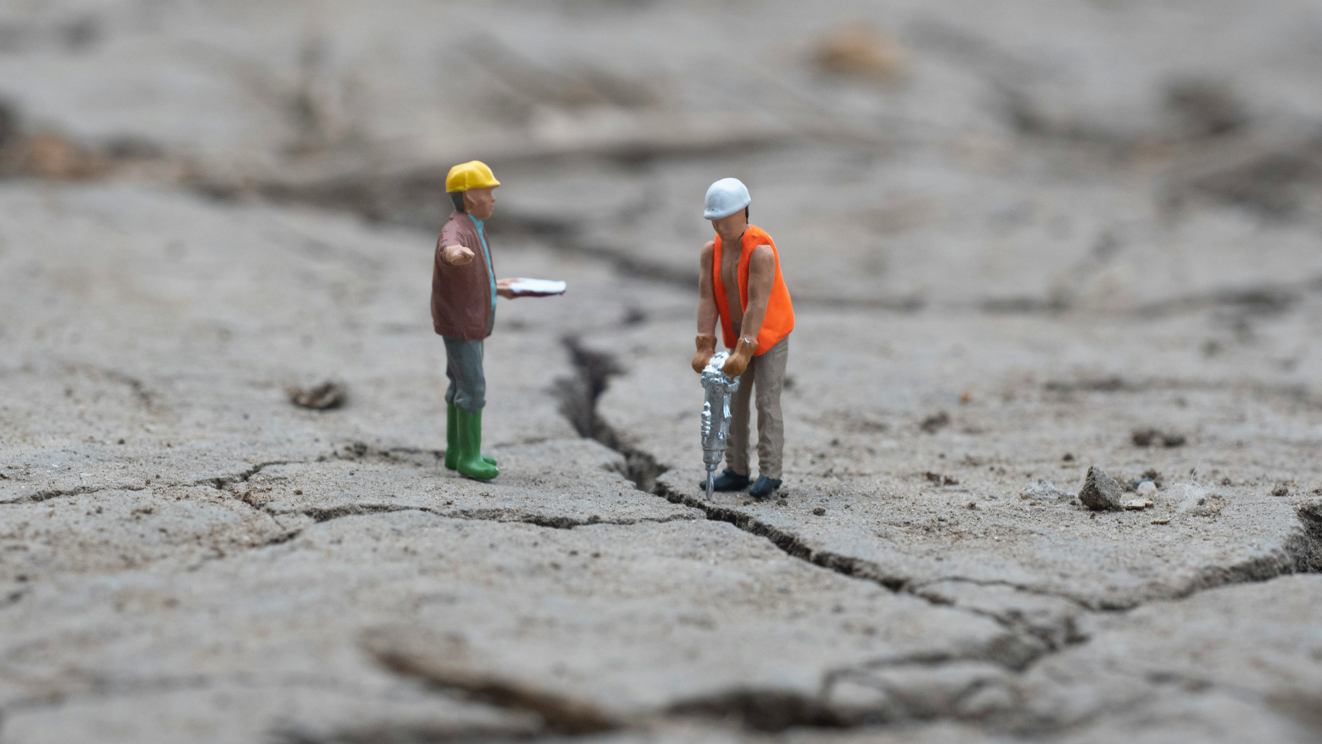 Mini construction workers at work